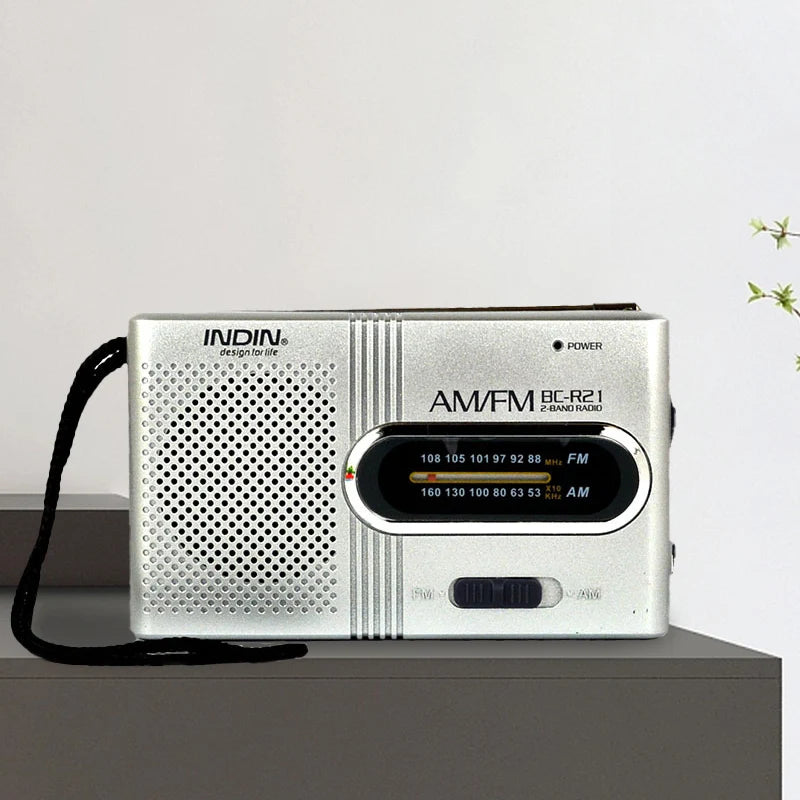 New Portable Mini Radio Handheld AM FM Dual Band Music Player with Telescopic Antenna