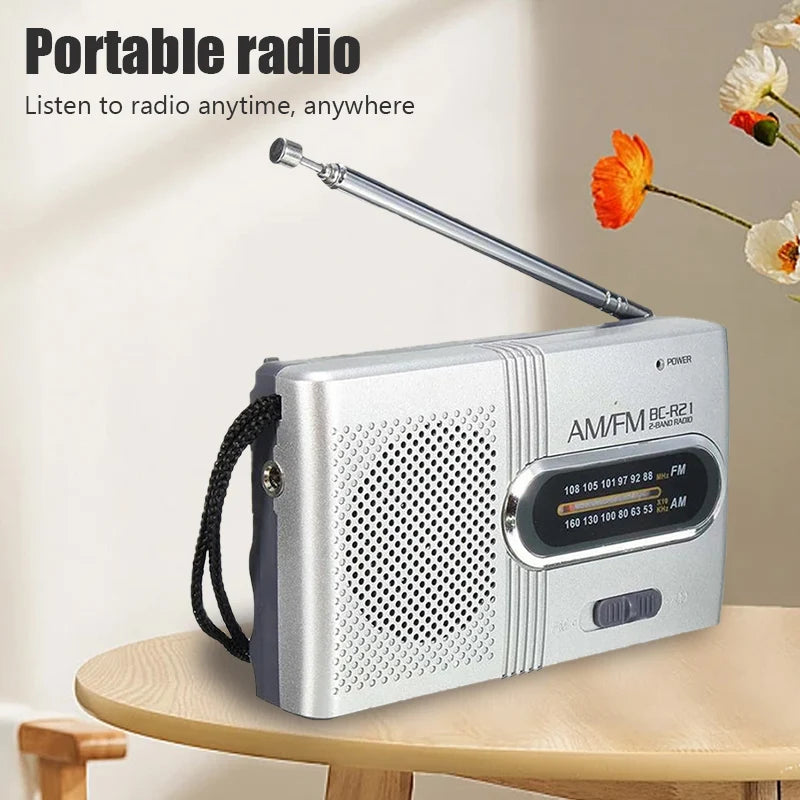 New Portable Mini Radio Handheld AM FM Dual Band Music Player with Telescopic Antenna